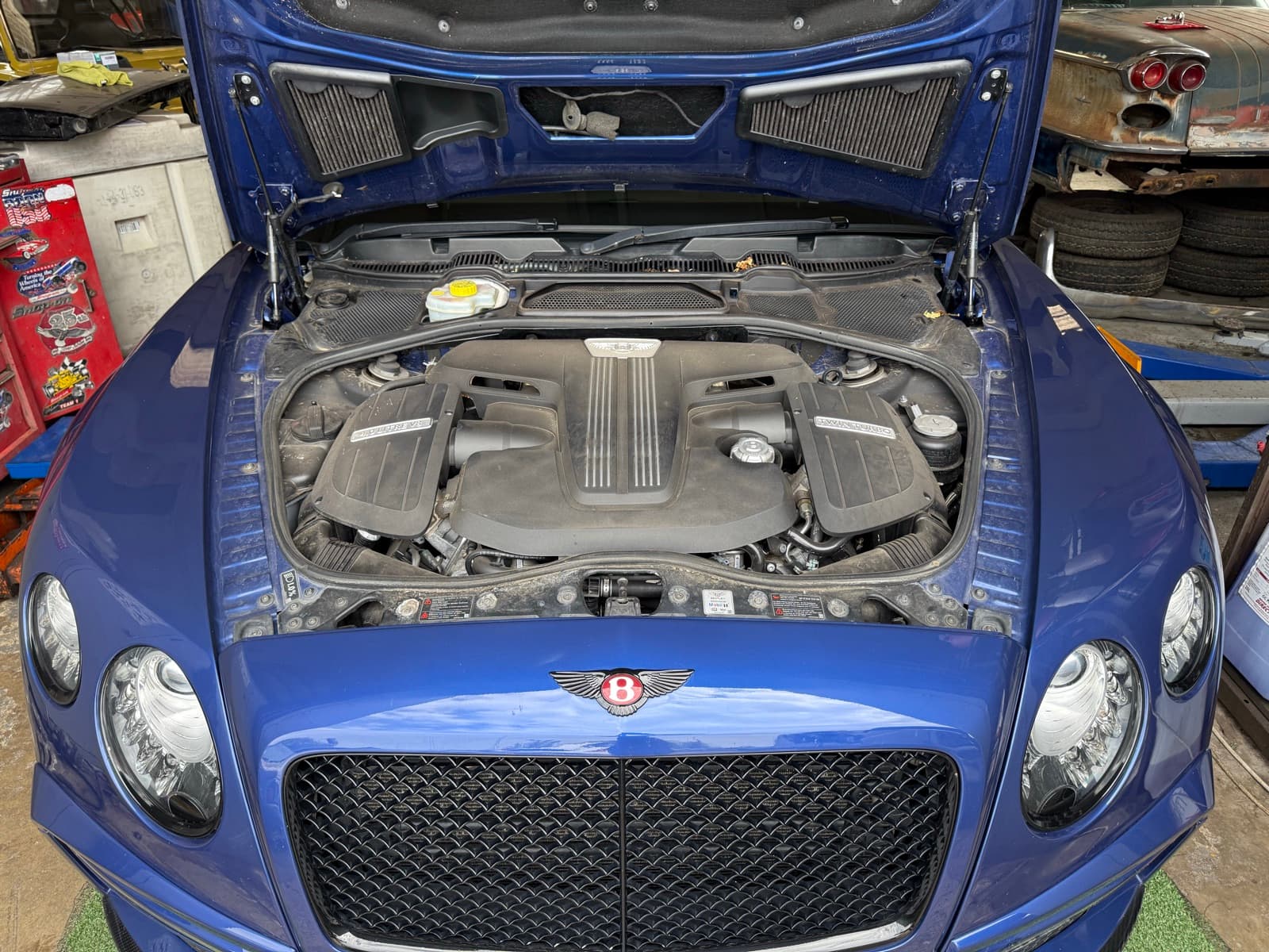 Bentley Onyx GTX 700 engine bay coated in road grime and dust before dry ice blasting